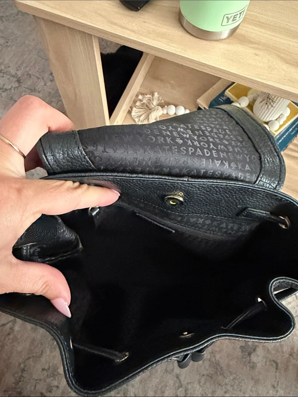 kate spade Black Pebbled Leather Drawstring Backpack